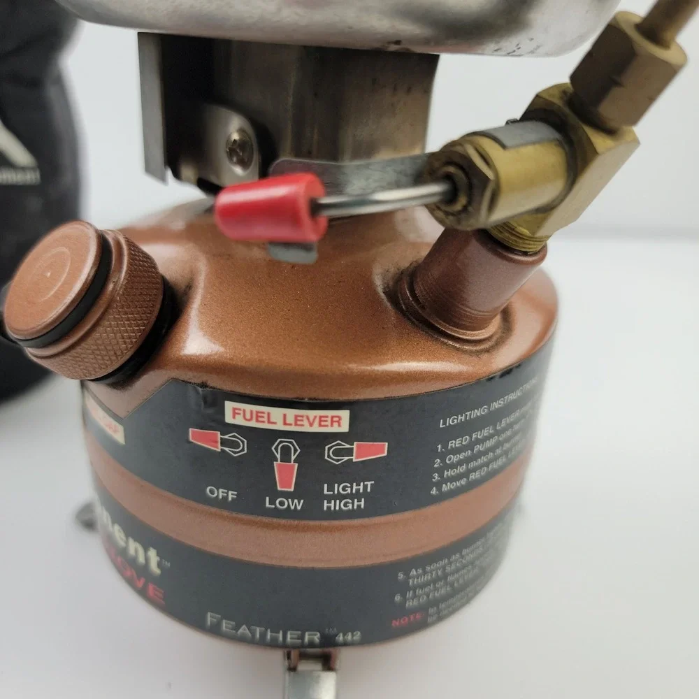 Coleman Exponent Feather 442 Dual Fuel Stove Copper with Peak 1 Case USA